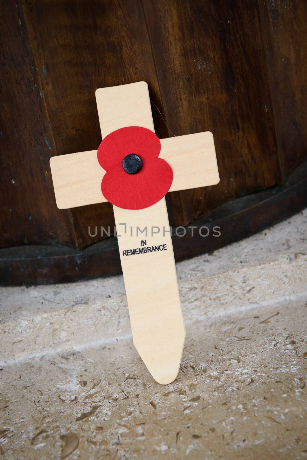 LONDON, UK - CIRCA JANUARY 2013: A poppy on a cross at Bomber Command Memorial