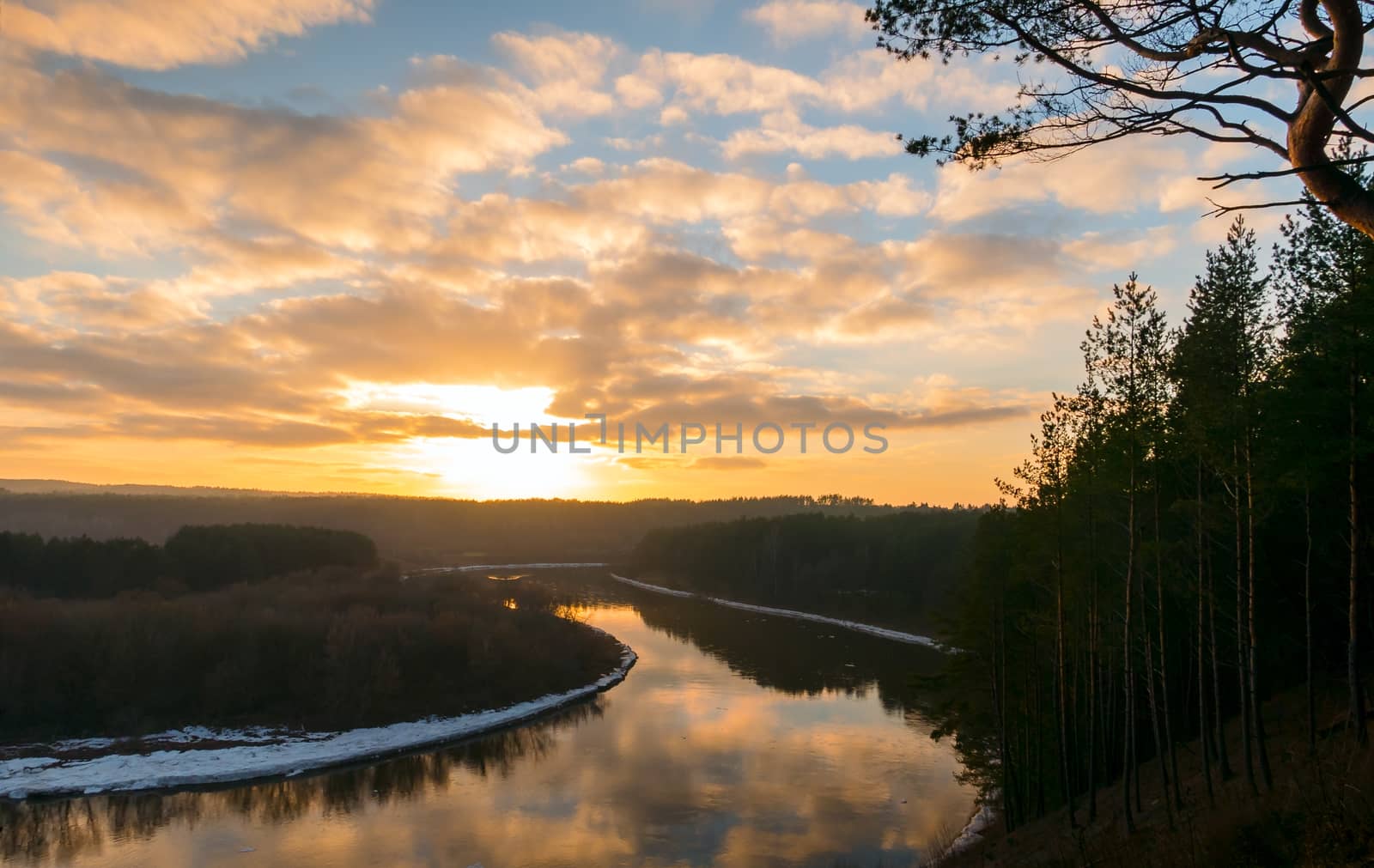 Winter sunset over the river by aleksaskv