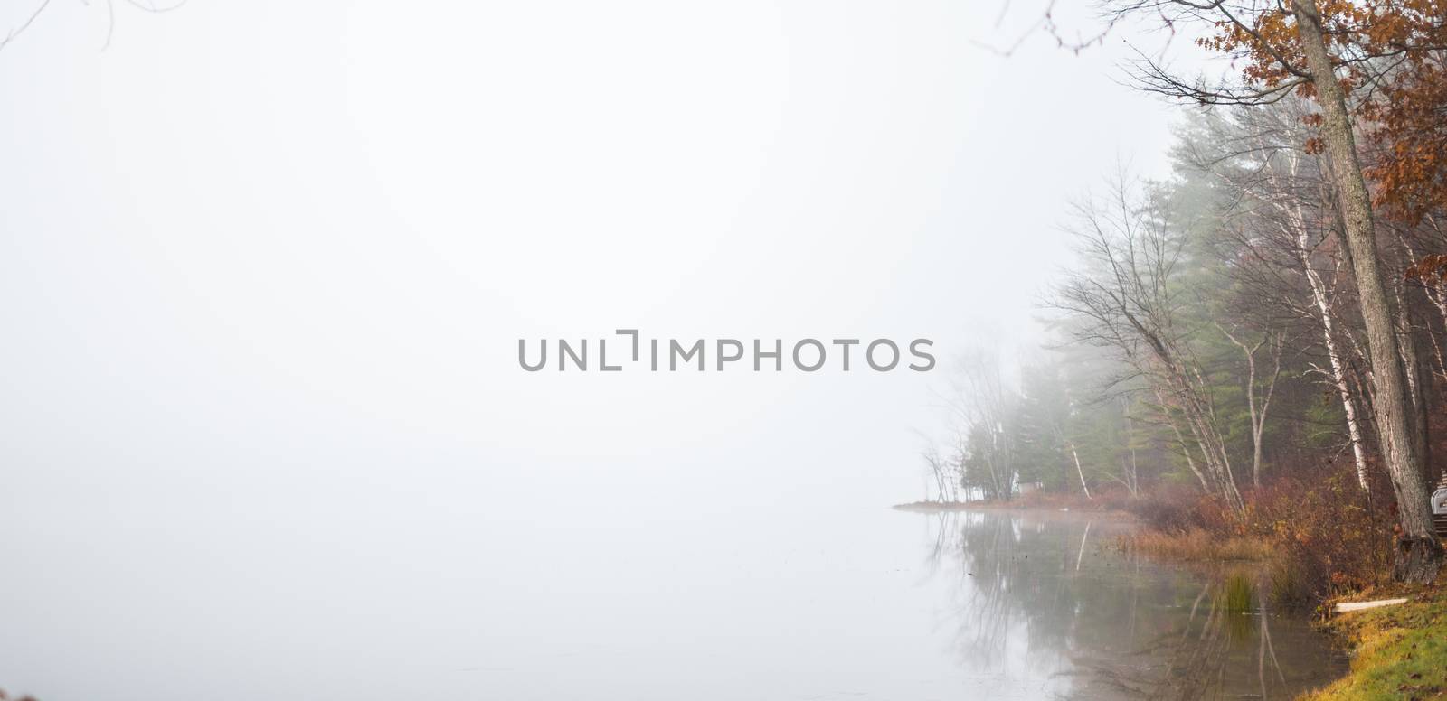 Still, cool air and warm lake water make for an early morning masking of the water in a near opaque fog show.