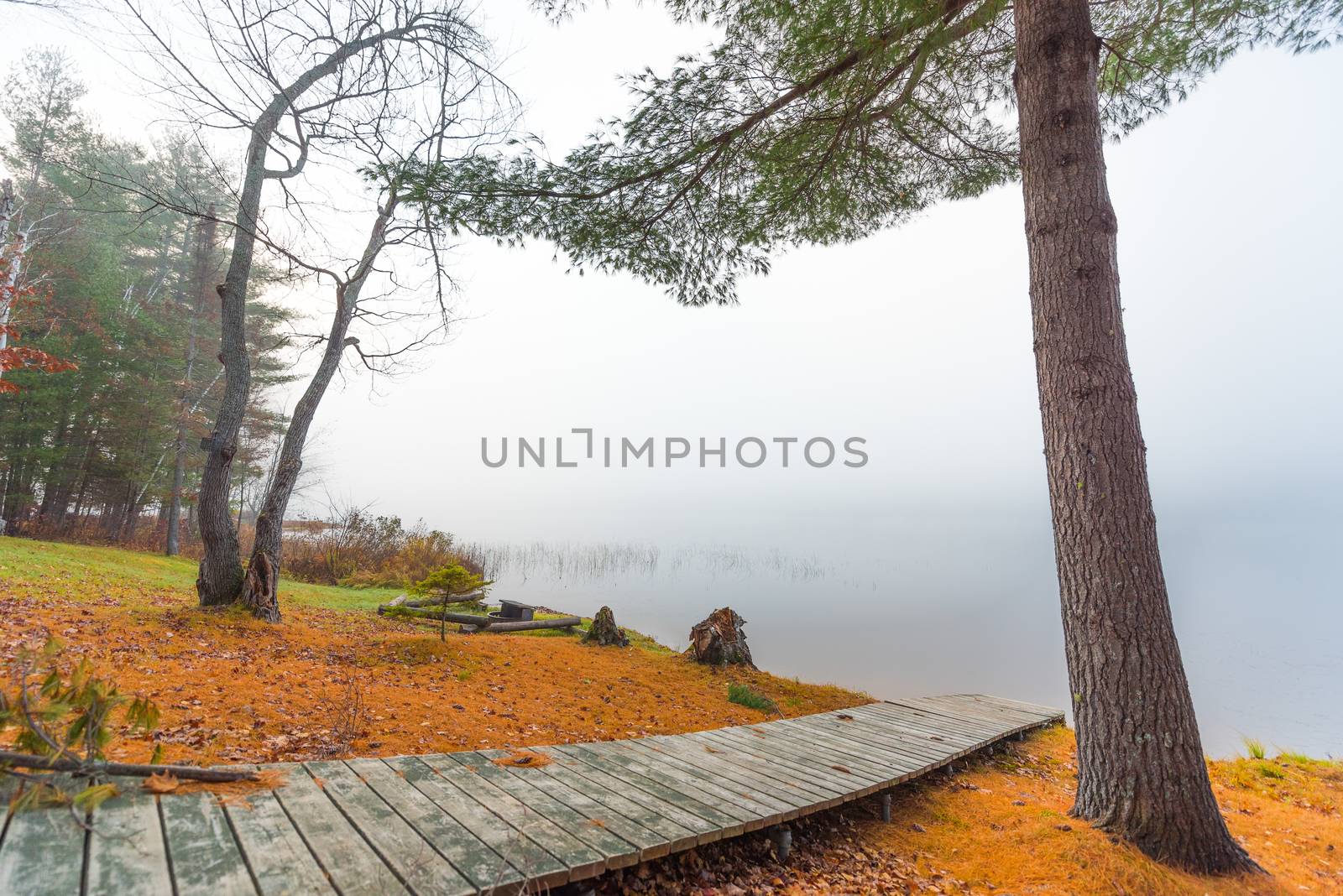 Still, cool air and warm lake water make for an early morning masking of the water in a near opaque fog show.