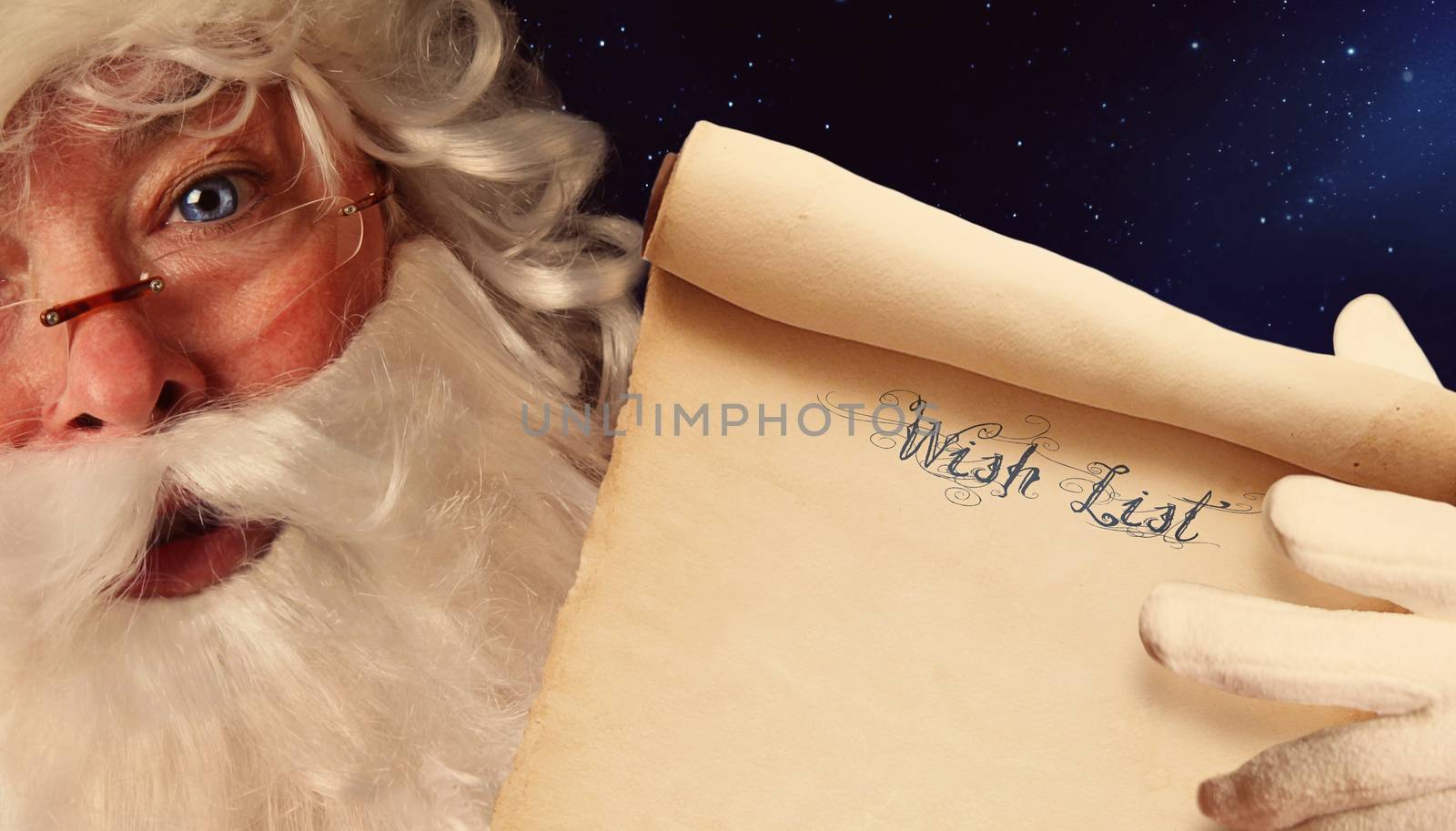 Closeup of Santa Clause holding scroll  by Sandralise