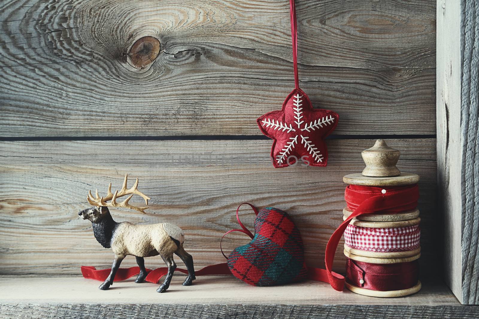 Christmas decorations on wood shelf by Sandralise