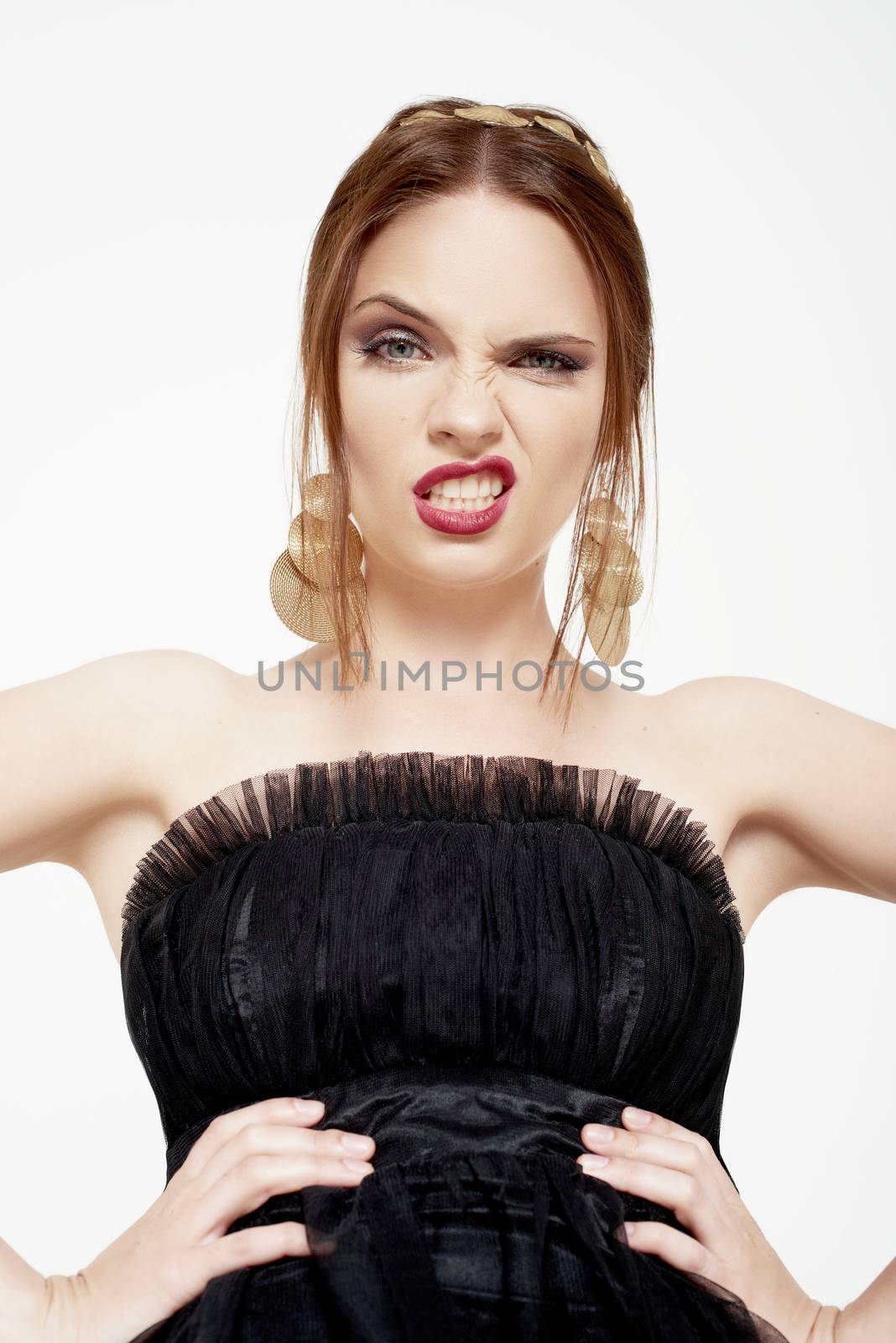 Fashion photo of young magnificent woman. Girl posing. Studio photo