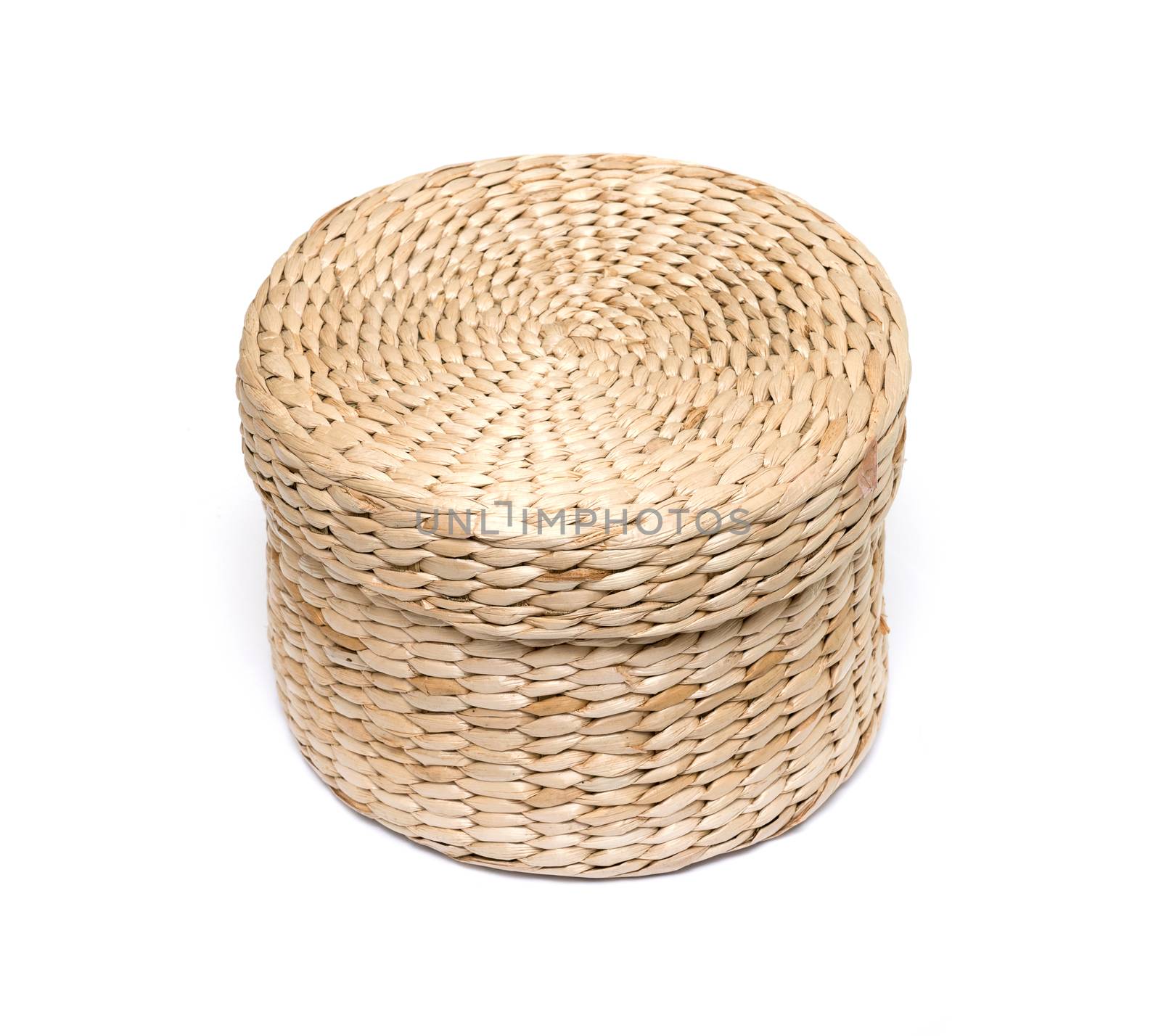 Small closed wicker box isolated on white