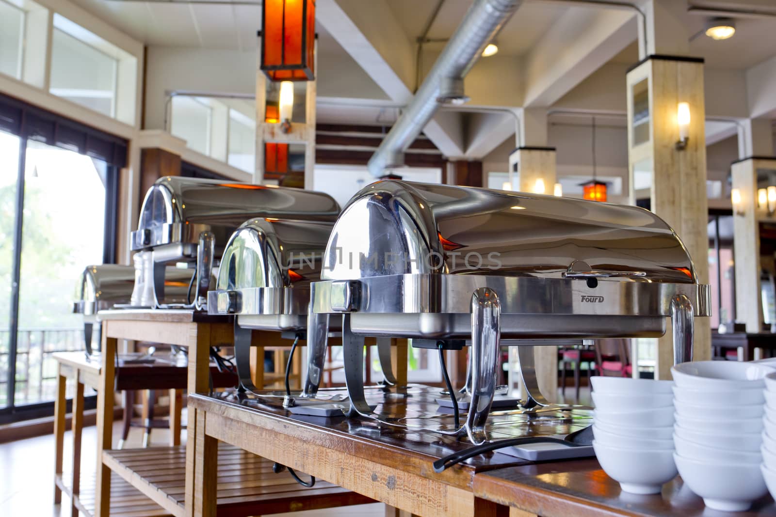Many buffet heated trays ready for service.