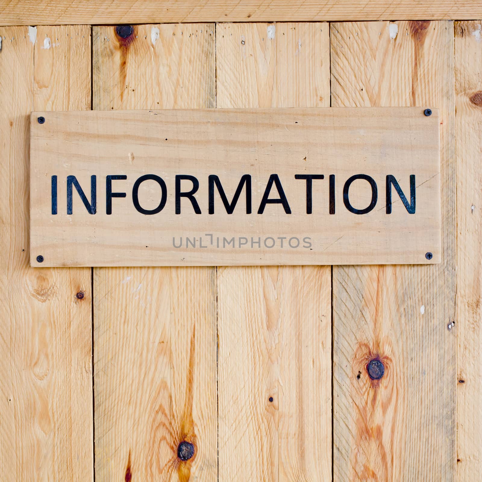 Wording Information sign on wood board.