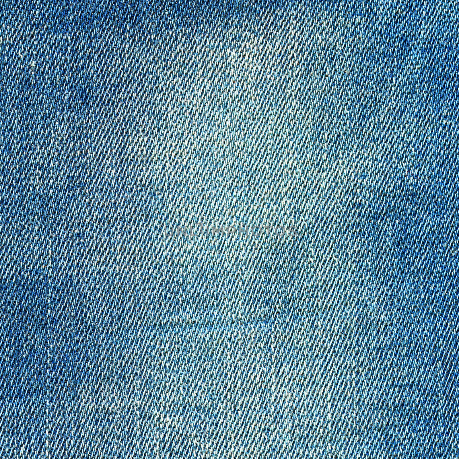 Denim texture. Light blue jeans vintage background