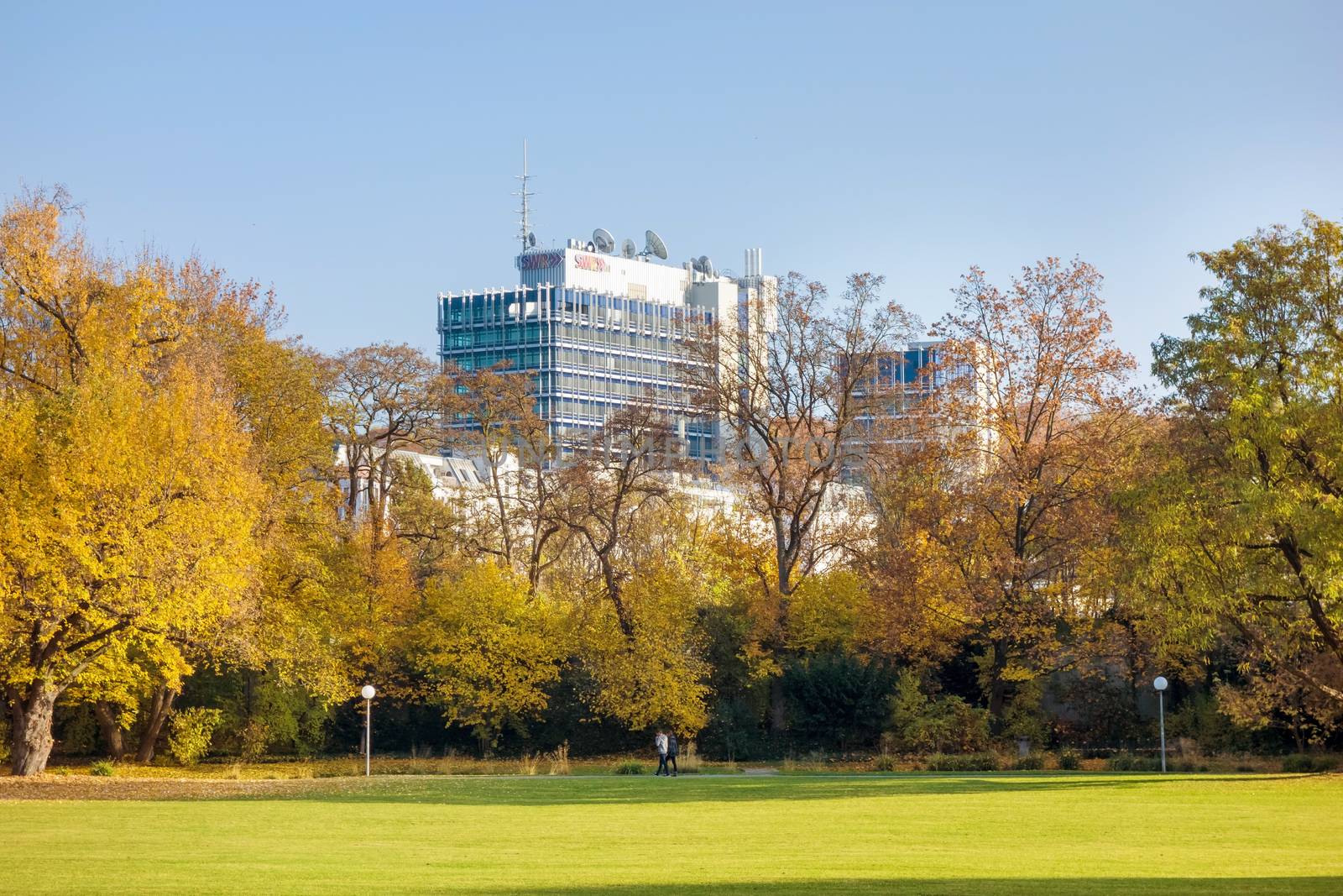 Stuttgart, Germany - November 1, 2013: Suedwestrundfunk SWR Funkhaus (TV and Radio broadcast studio) Stuttgart - view from Unterer Schlossgarten (Lower Castle Garden), autumn landscape.