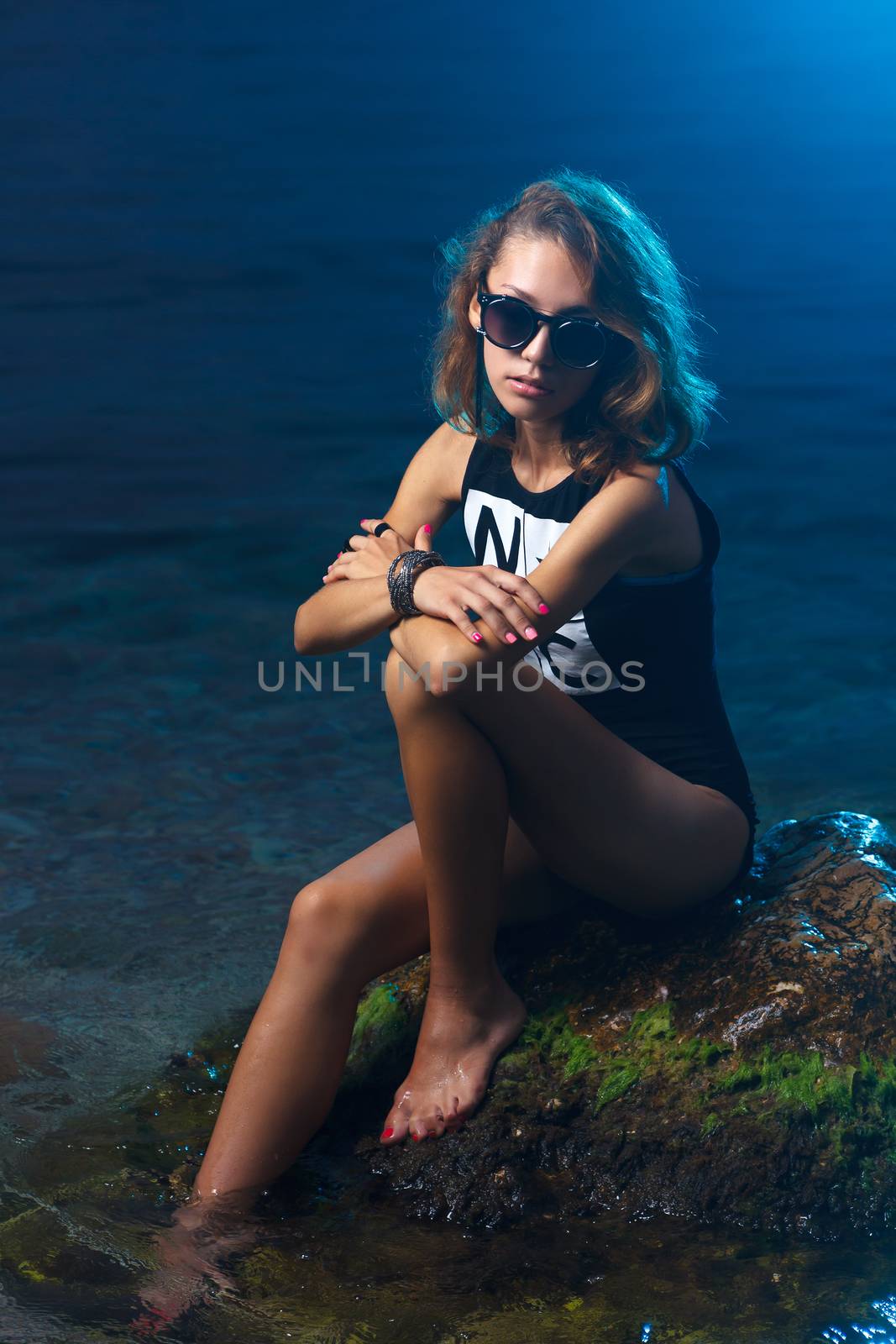 Young teen girl fashion shoot at sunset beach by mrakor