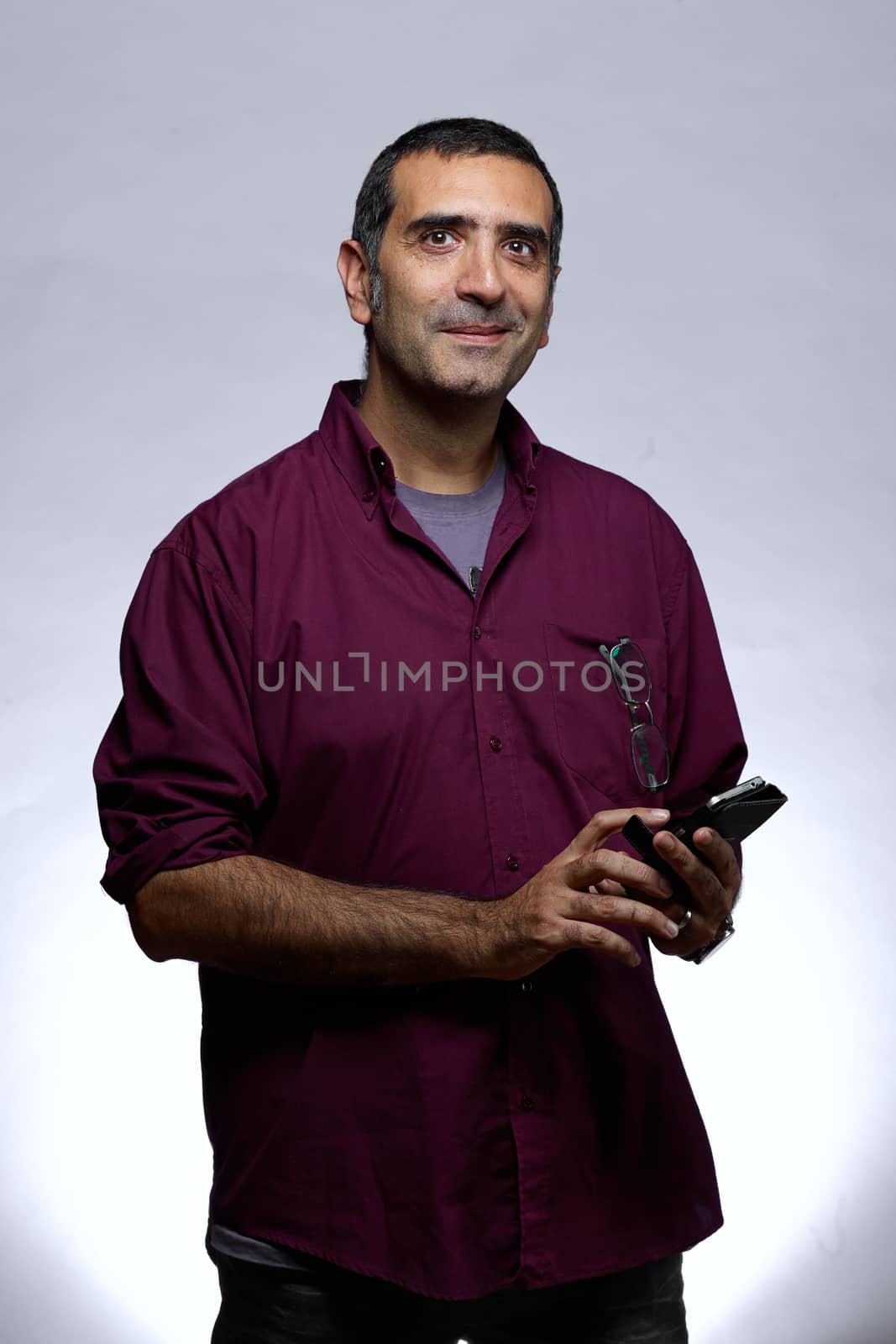 facial expression adult man in purple shirt