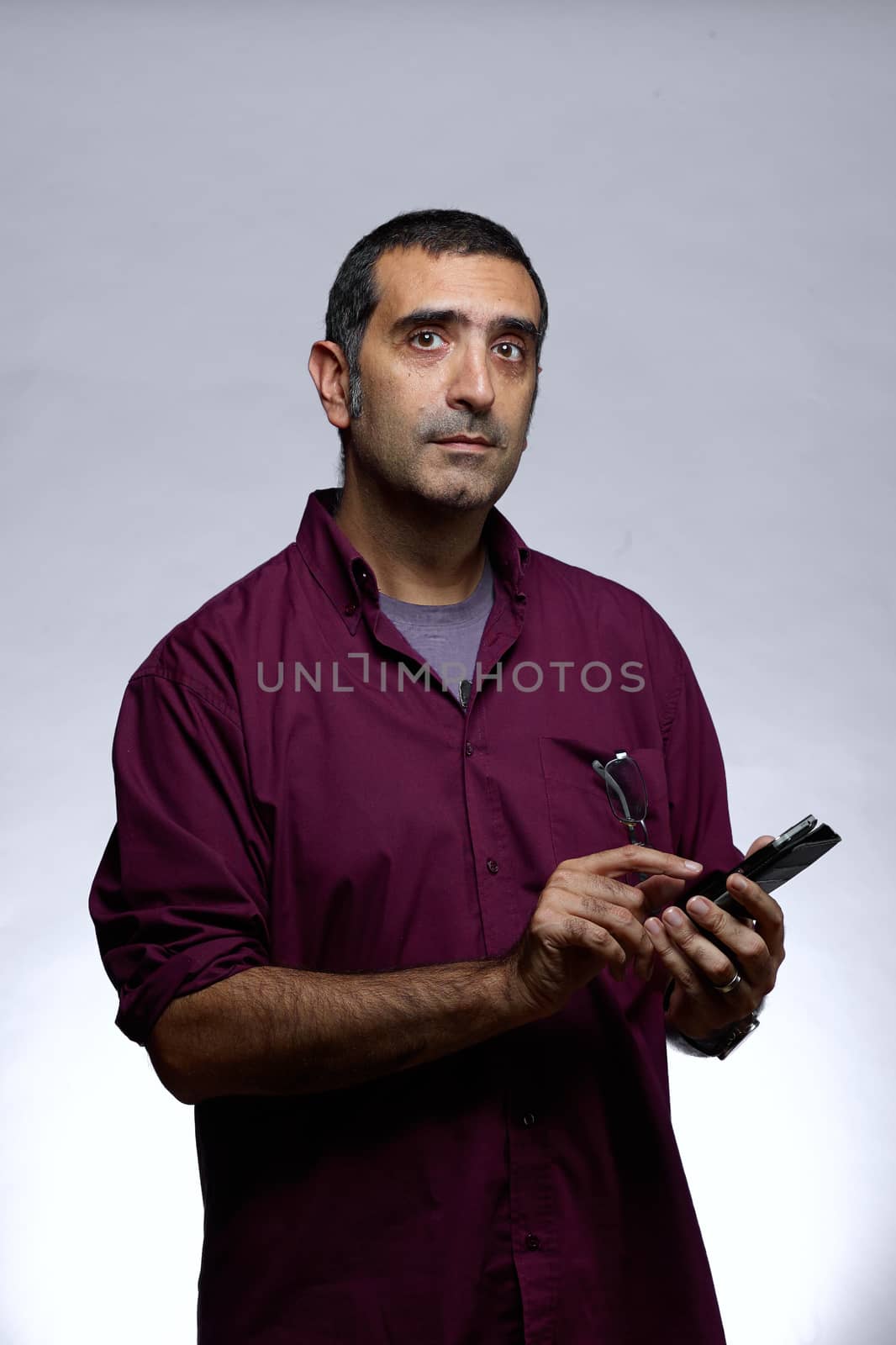facial expression adult man in purple shirt