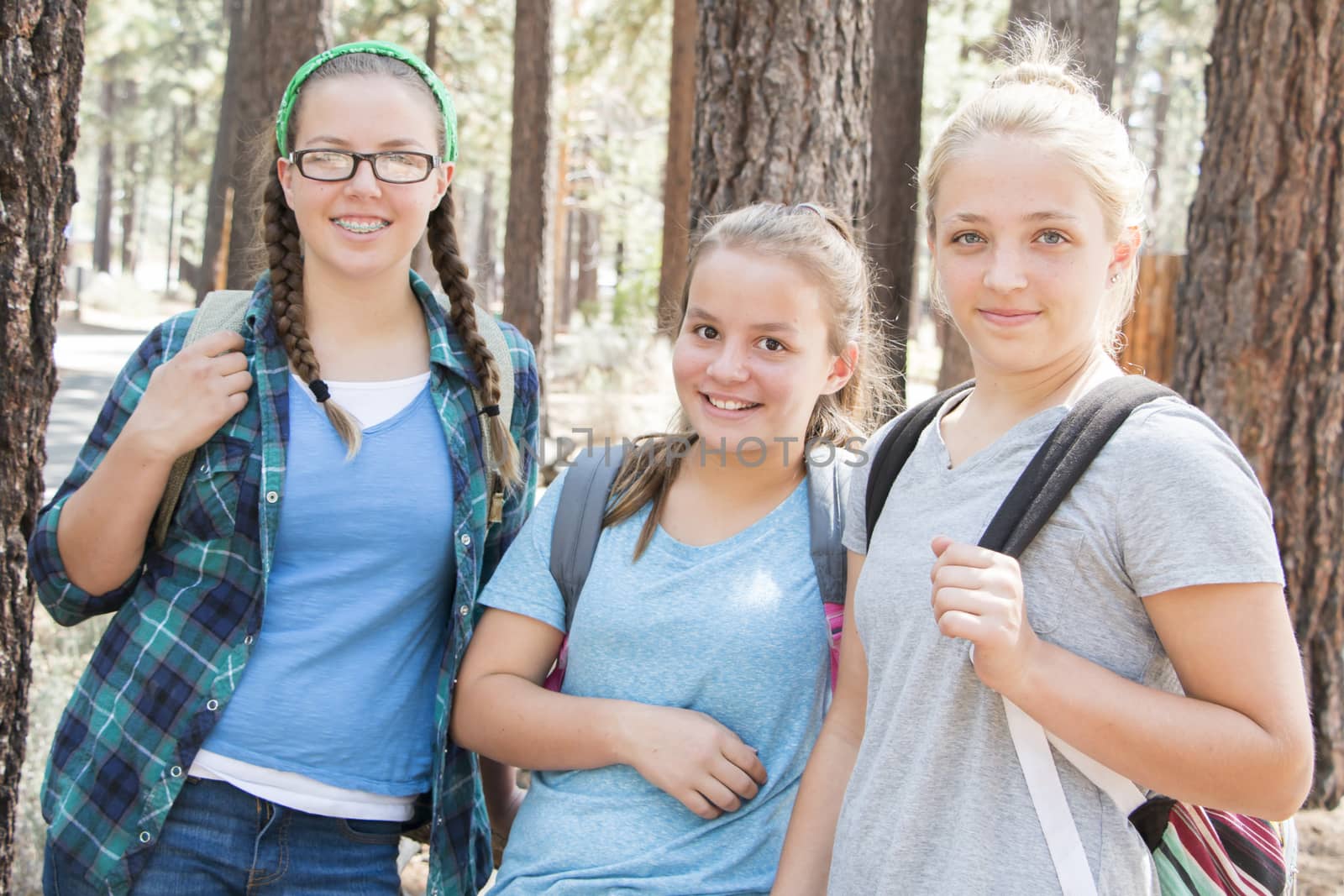 Three Young Girl Friends together at the Park