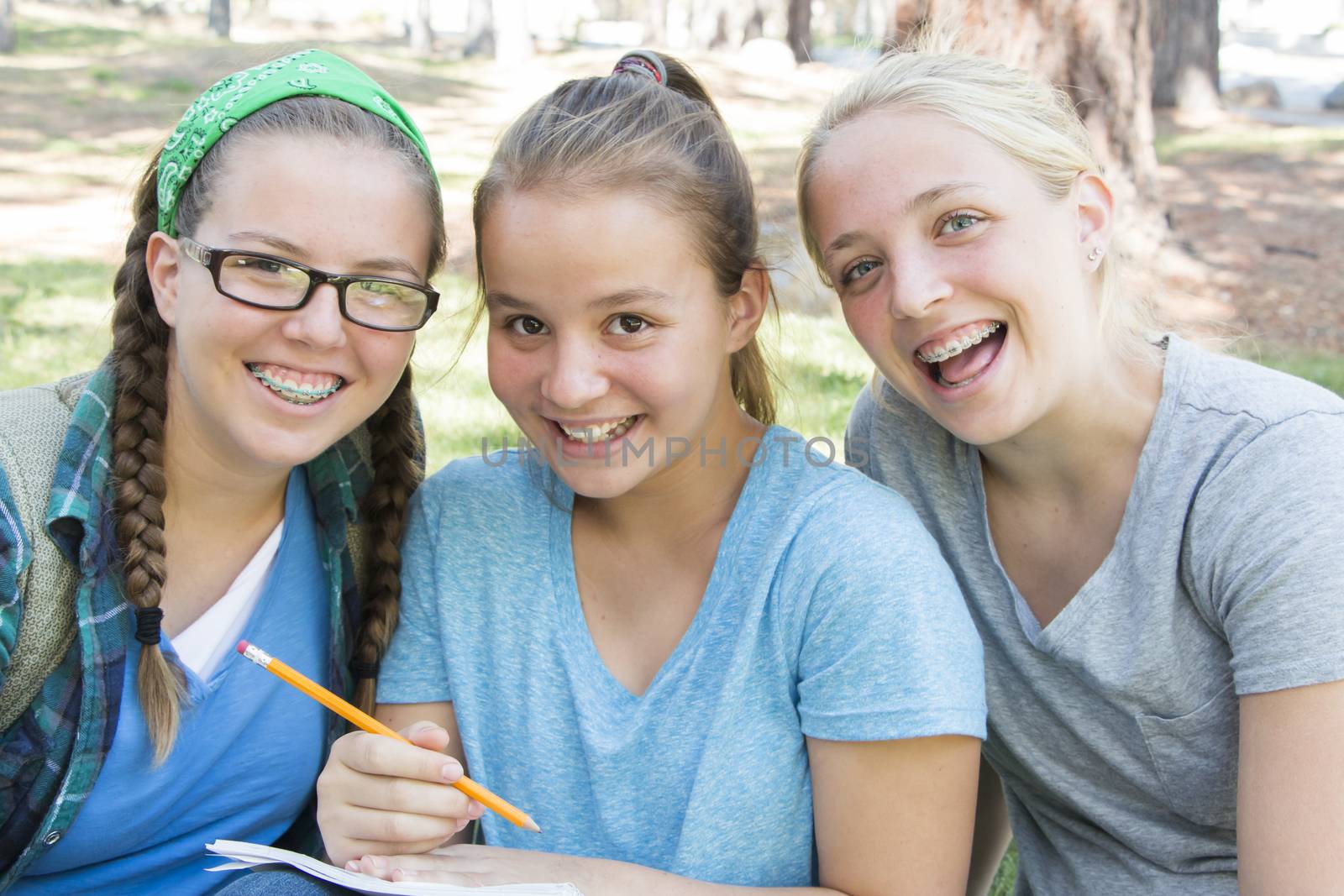 Young Girls Studying at the Park