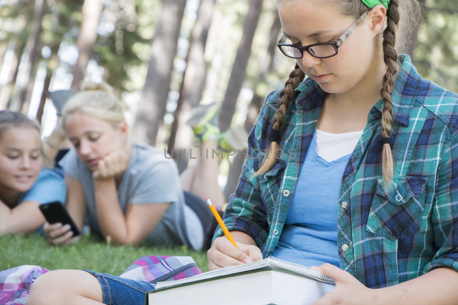 Young Girls Studying at the Park