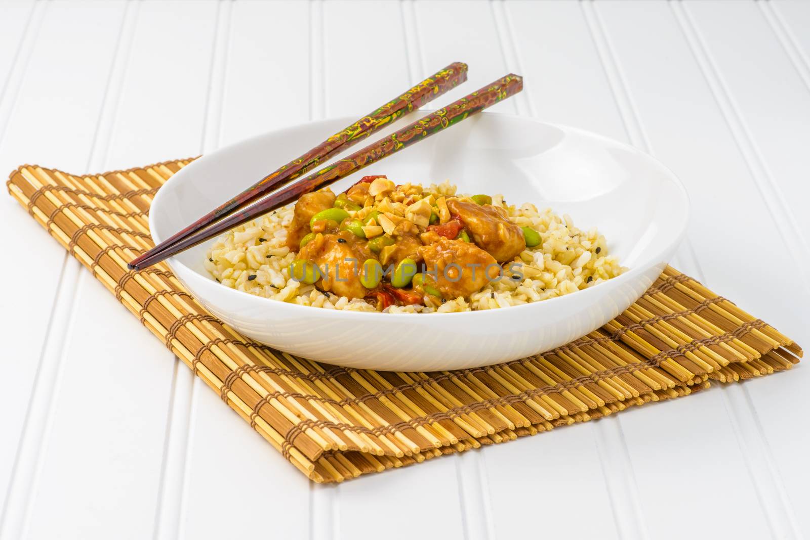 Spicy oriental peanut chicken served with rice.