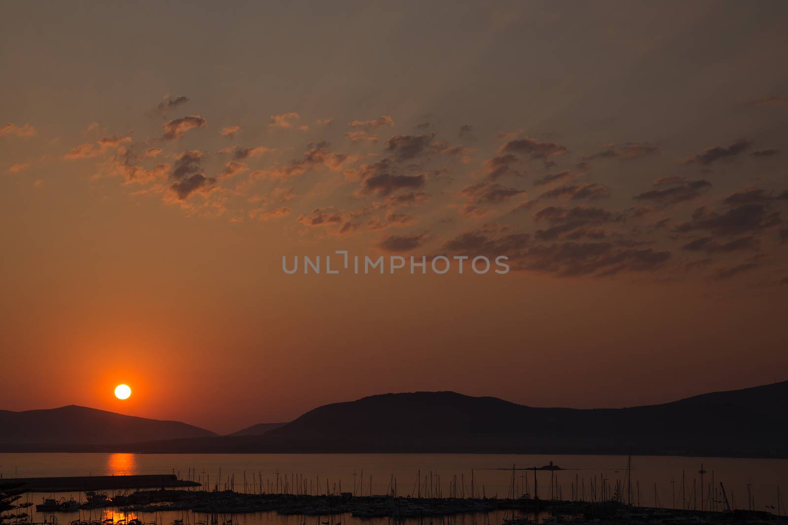 Scenic sunset over the sea in Sardinia