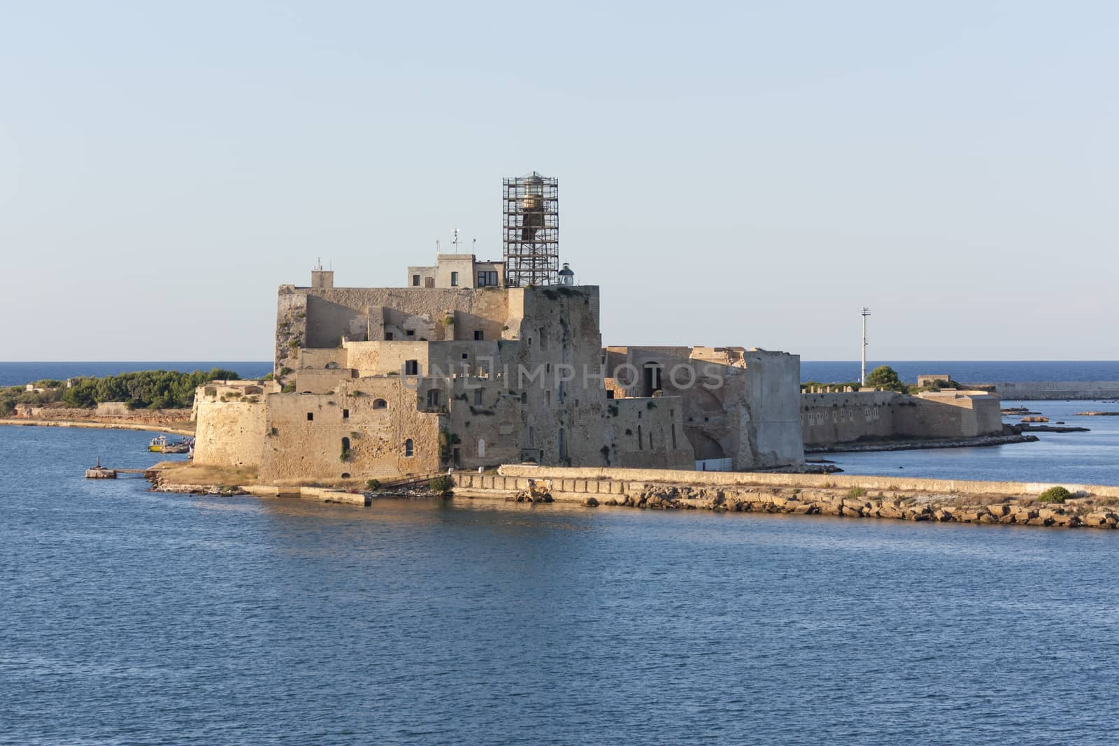 Lighthouse under renovation at the port of Brindisi in southern Italy