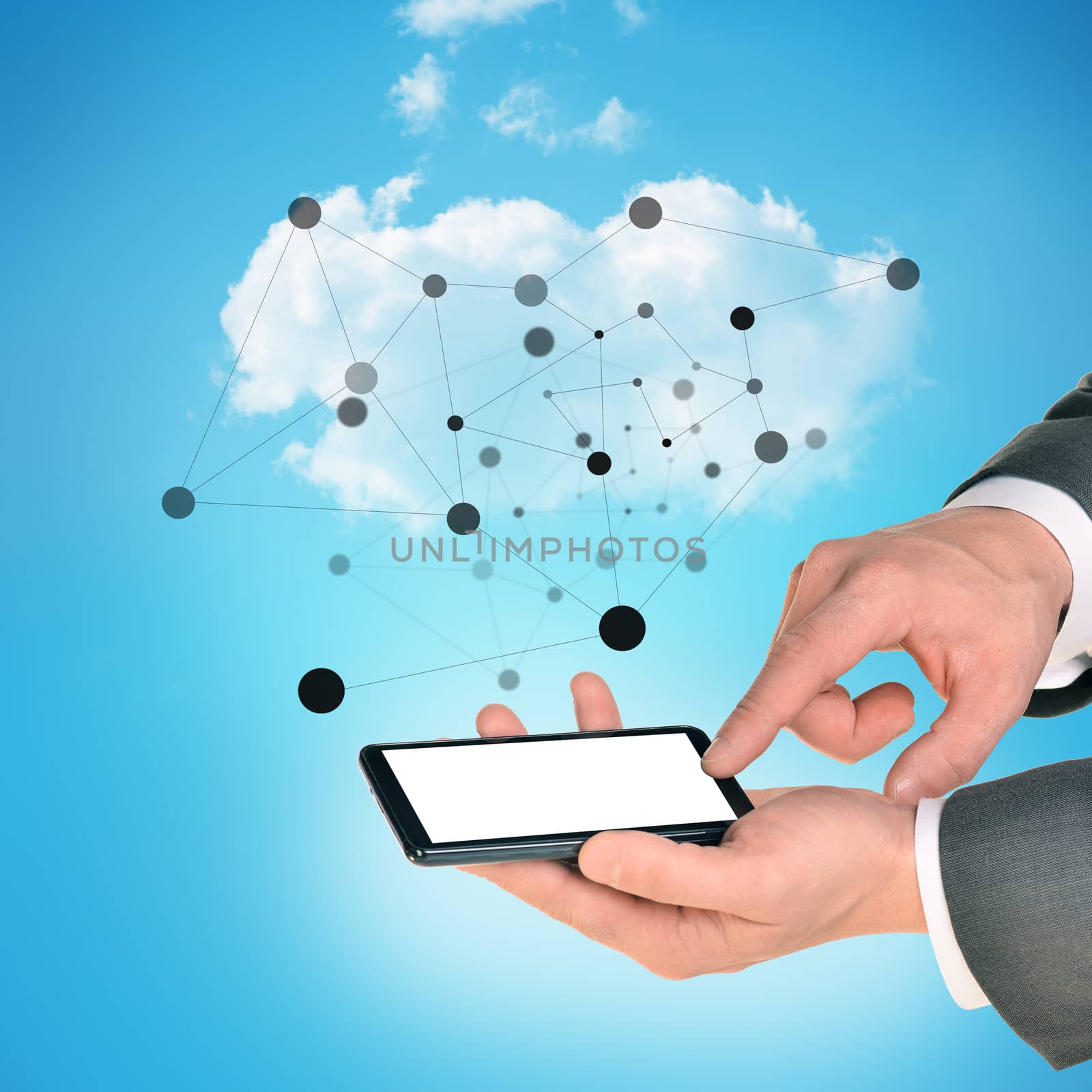 Businessman hands holding smartphone on blue sky background