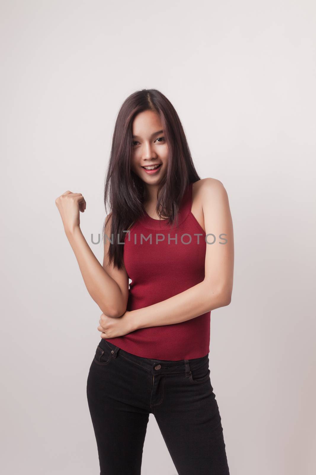 closeup fashion portrait of asian young sexy woman posing in stu by nopparats