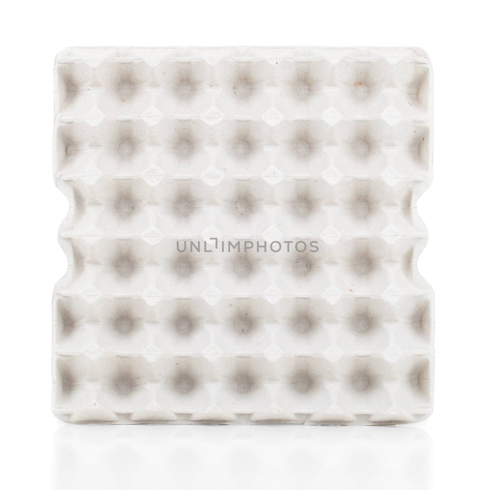 empty box for eggs, on a white background by motorolka