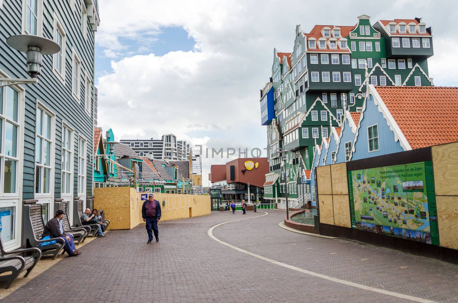 Zaandam, Netherlands - May 5, 2015: People walk on a pedestrian zone in Zaandam by siraanamwong