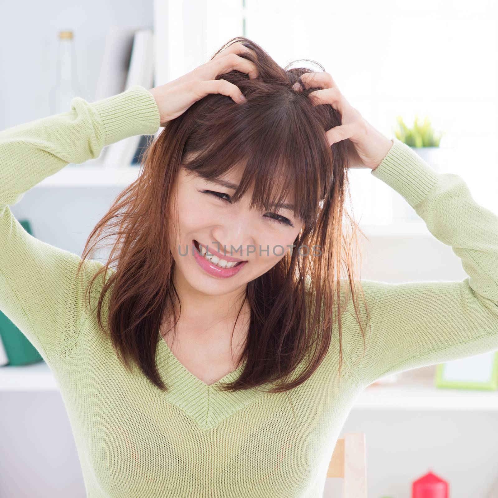 Asian woman scratching itchy head by szefei