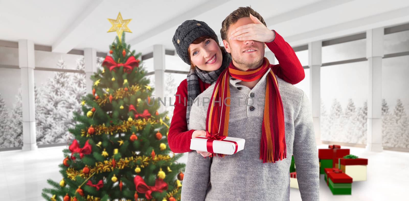 Composite image of woman giving man a present by Wavebreakmedia