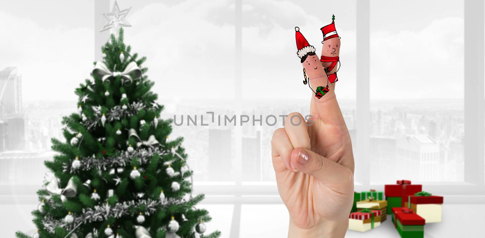 Christmas fingers against home with christmas tree