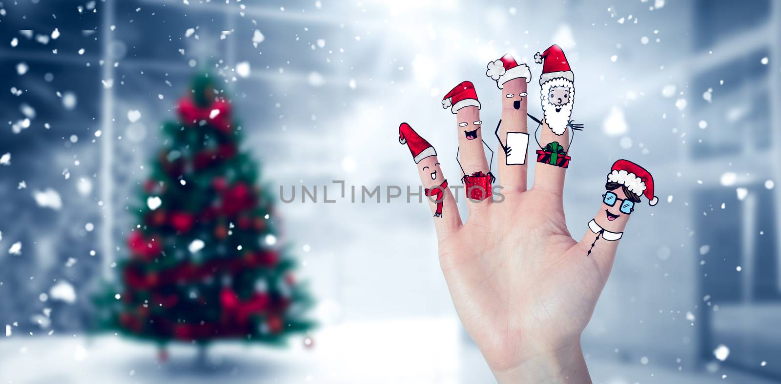 Composite image of christmas caroler fingers by Wavebreakmedia