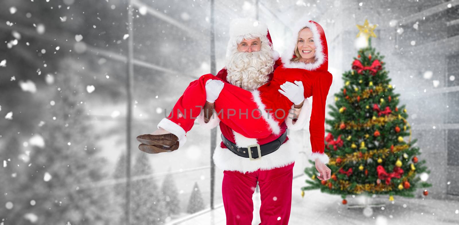 Santa and Mrs Claus smiling at camera  against home with christmas tree