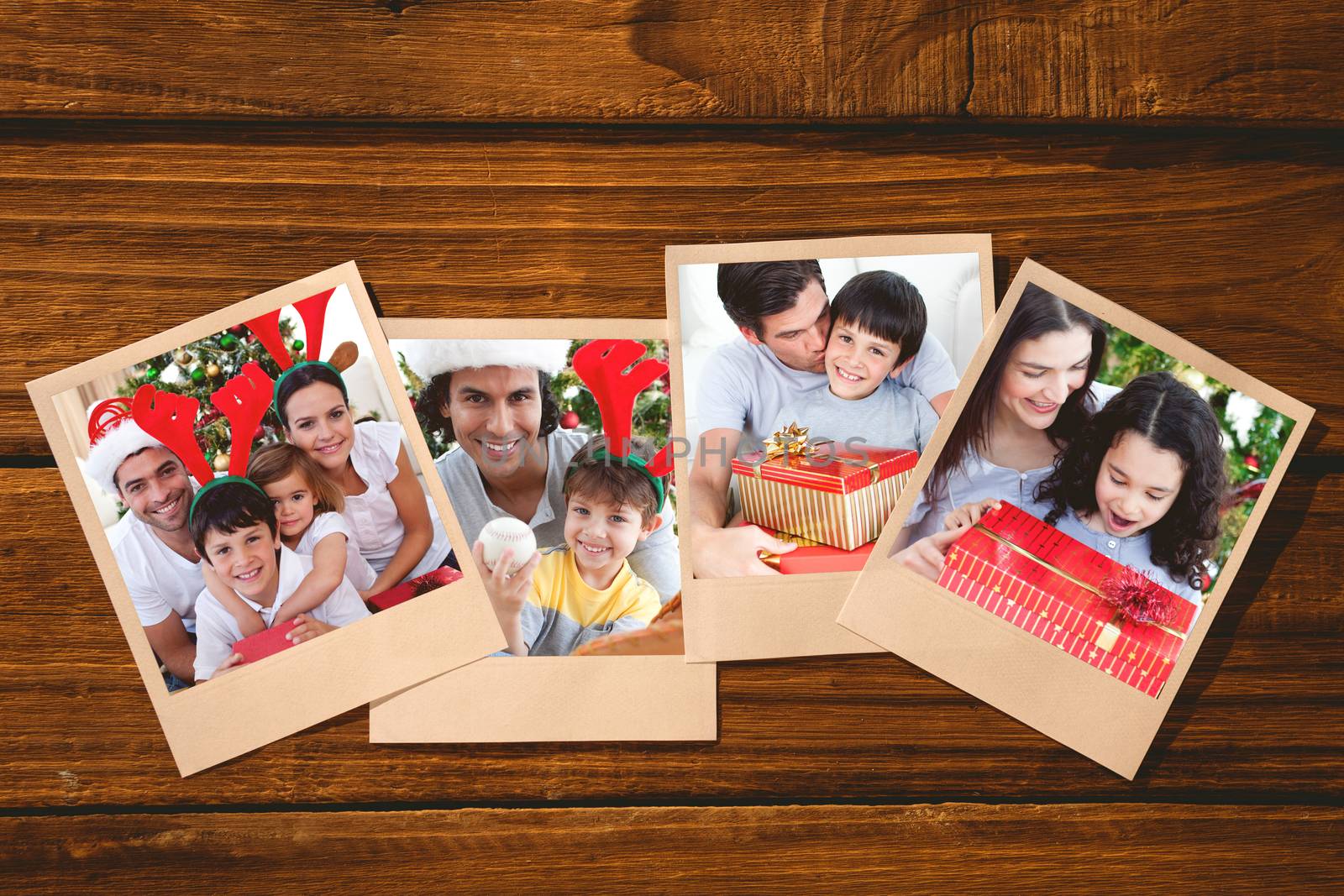 Composite image of lovely family giving presents for christmas by Wavebreakmedia