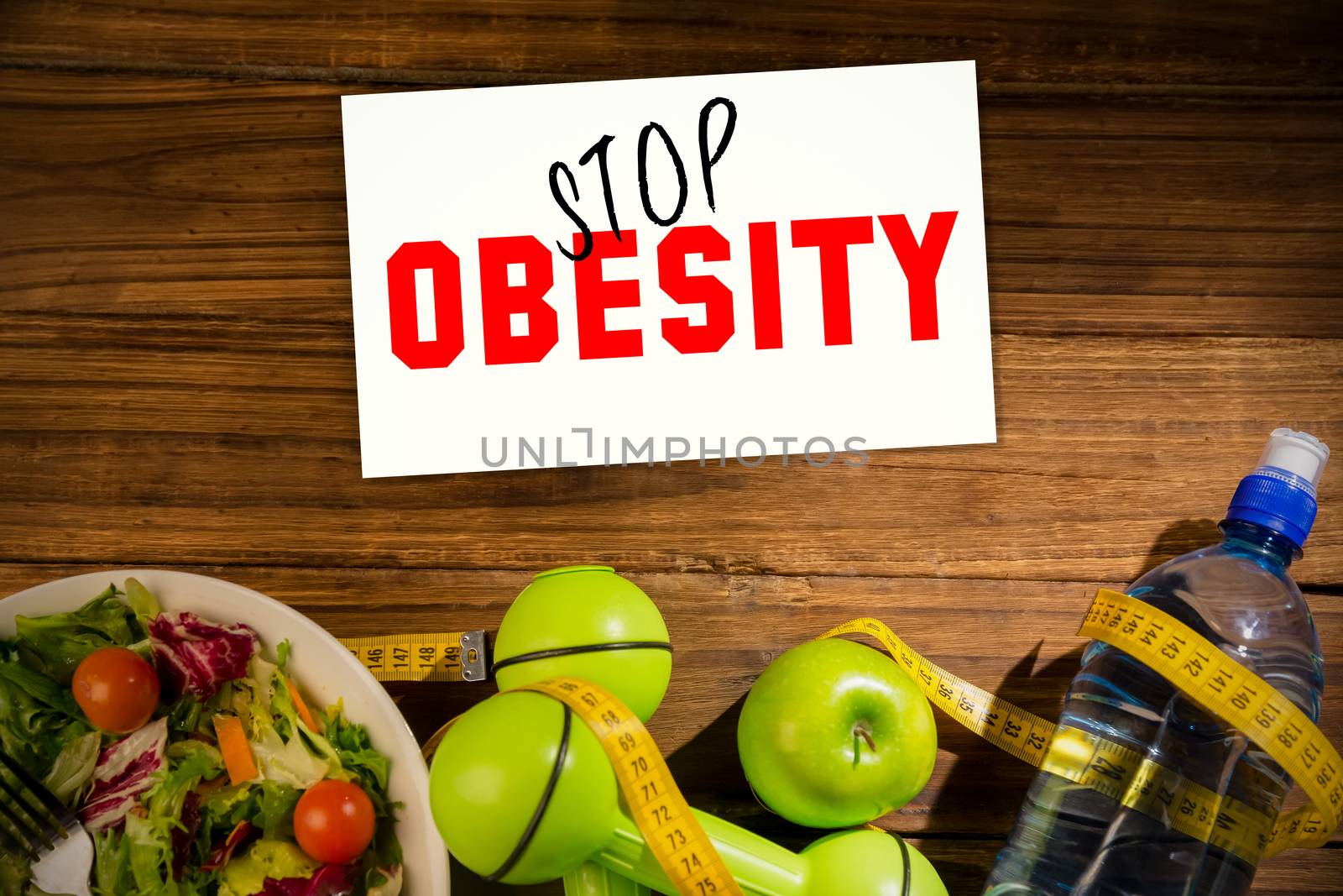 Composite image of stop obesity by Wavebreakmedia