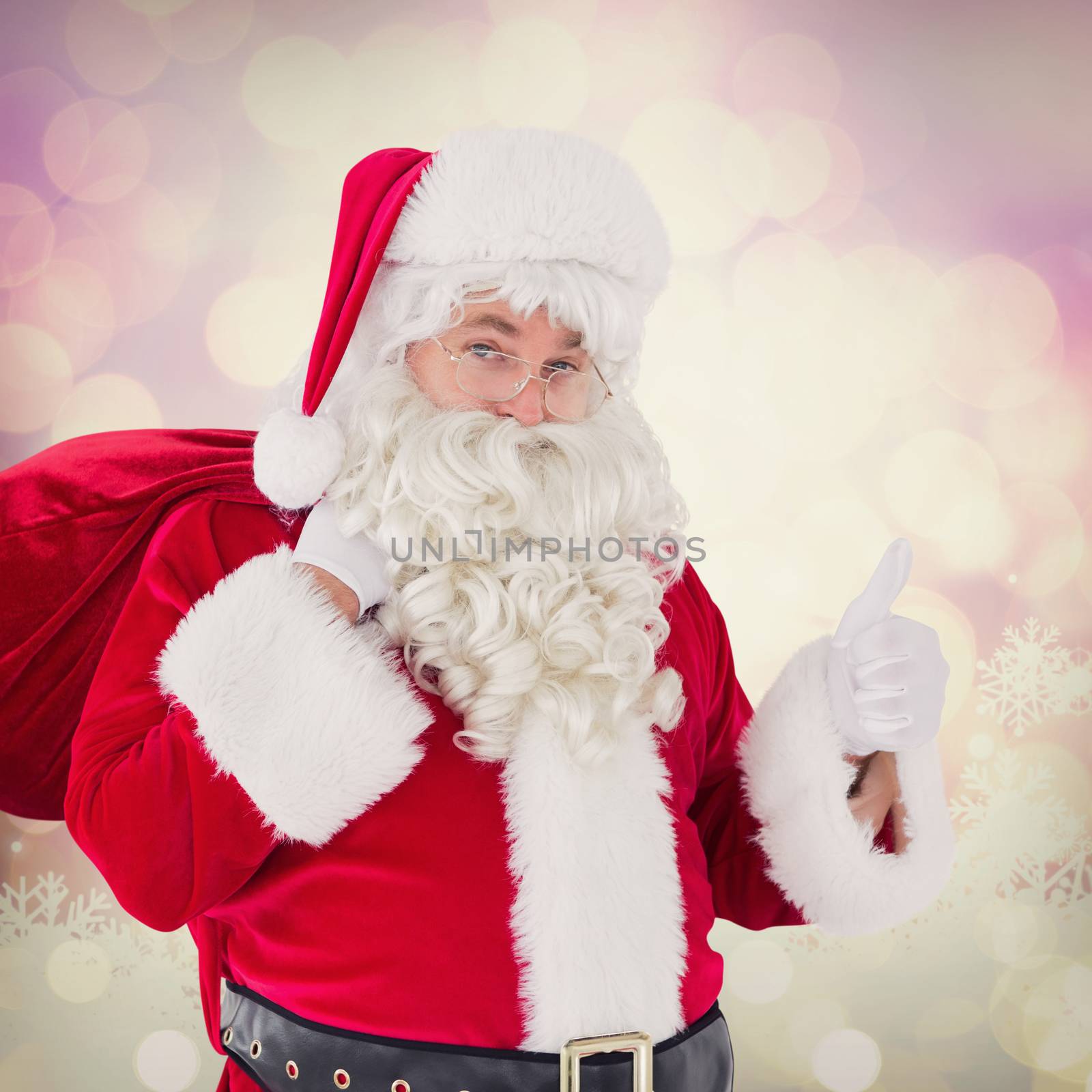 Santa claus with his sack and thumbs up against glowing christmas background