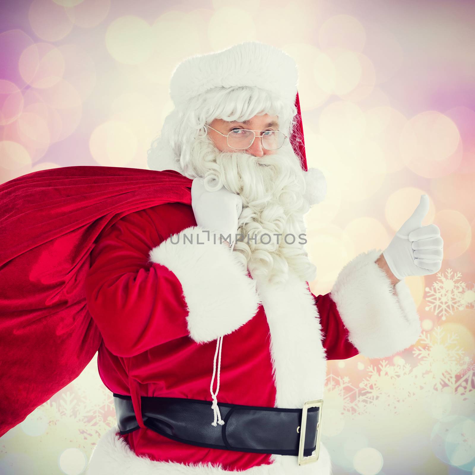 Composite image of positive santa with his sack and thumbs up by Wavebreakmedia