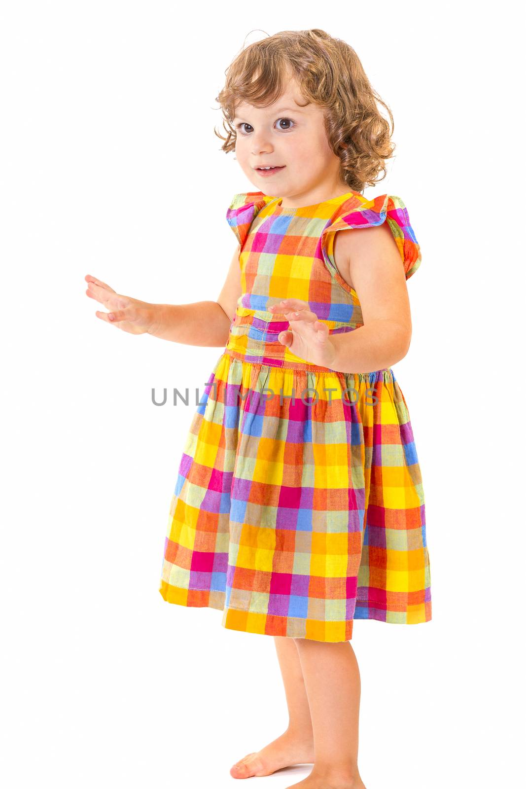 Little girl with hands up on white background