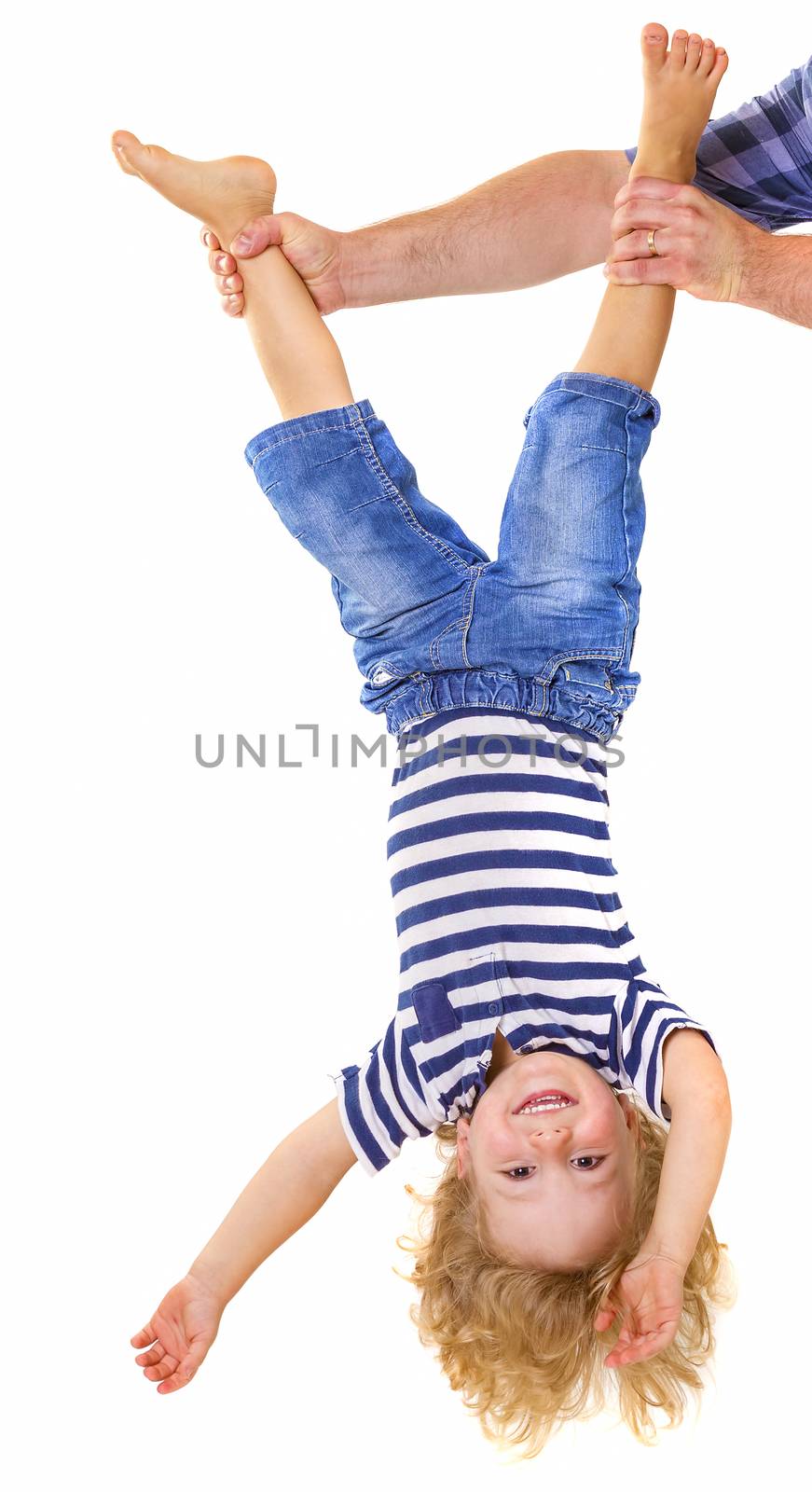 Little boy upside down by manaemedia