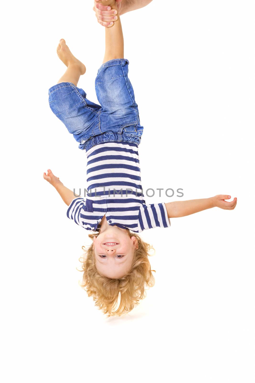 Little boy upside down by manaemedia