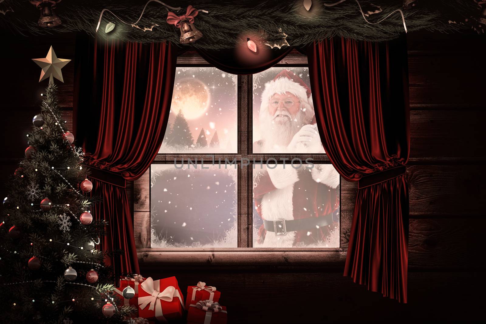 Composite image of santa carries his red bag and smiles by Wavebreakmedia
