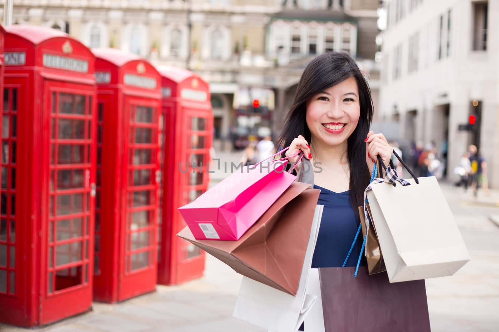 Japanese woman in London shopping