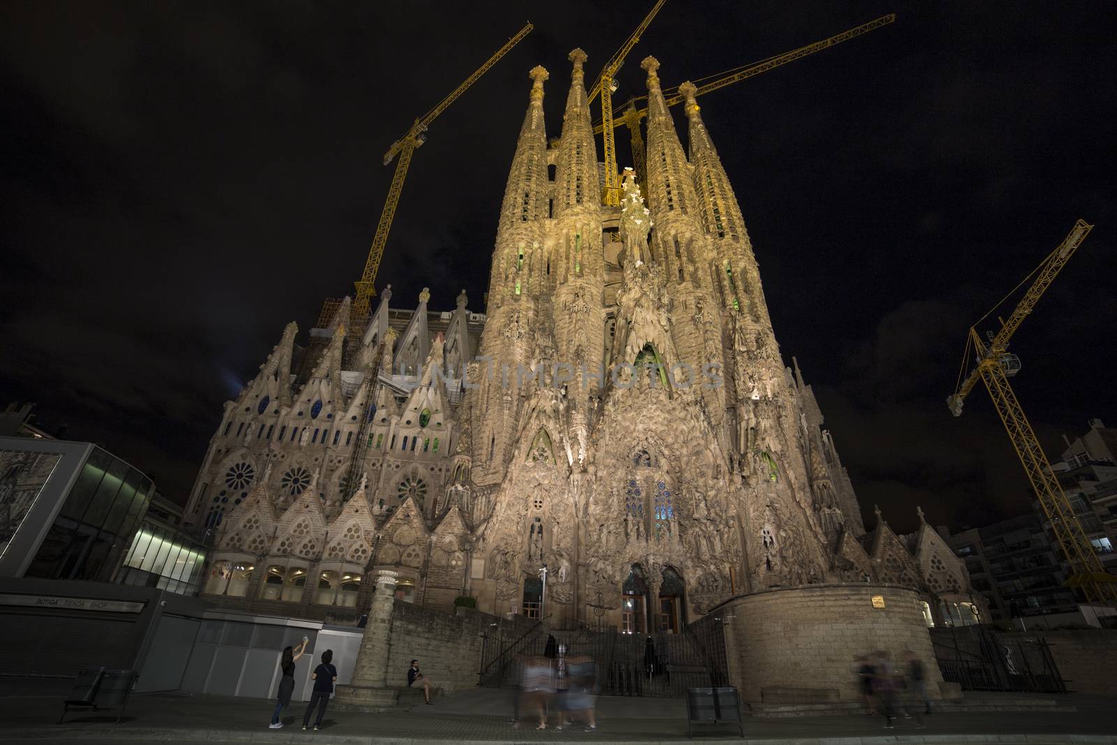 Barcelona, Spain - September 19, 2015: Sagrada Familia at night. Gaudi's profound catholicism inspired his designs of Sagrada Familia.