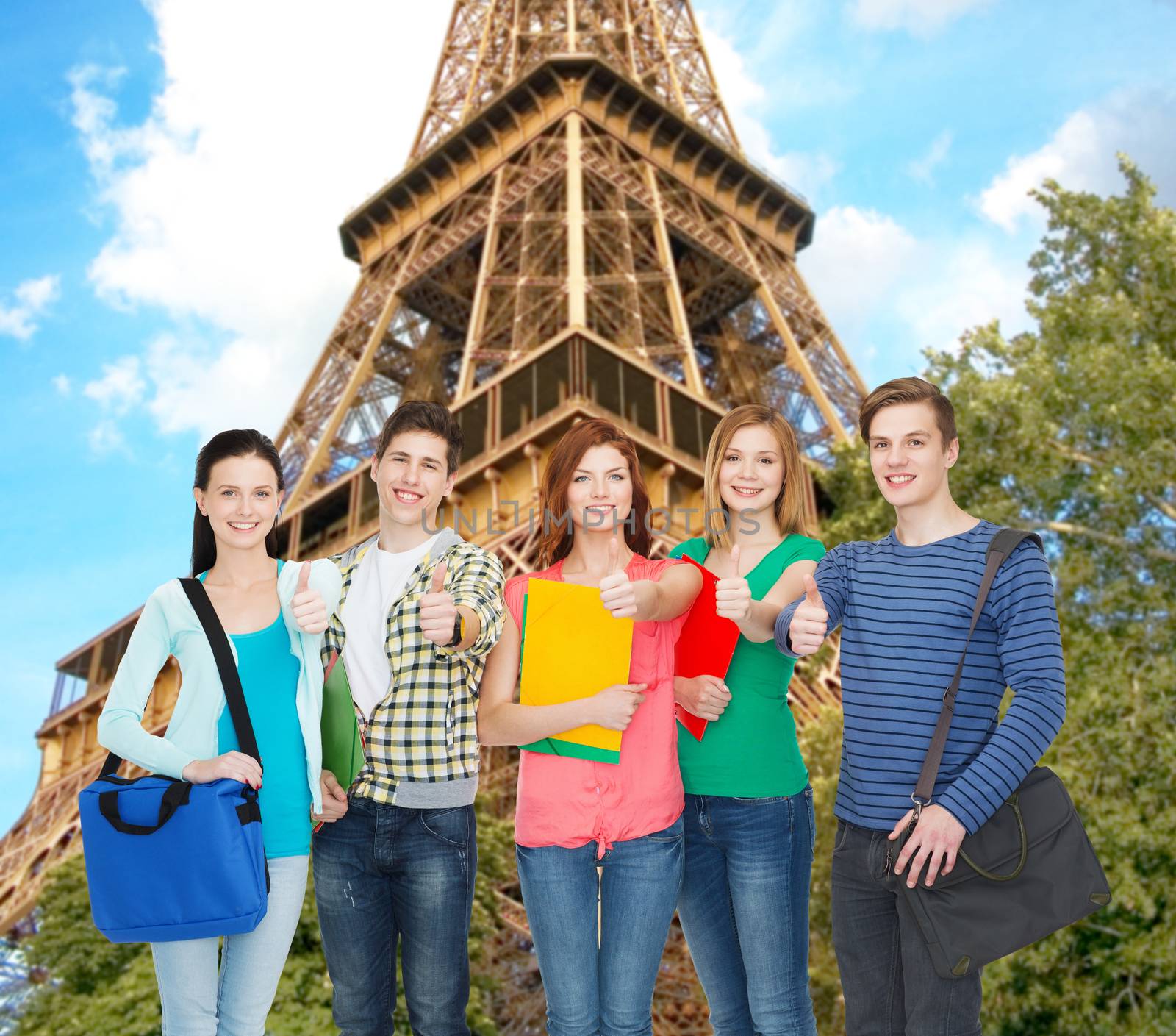 education and people concept - group of smiling students standing