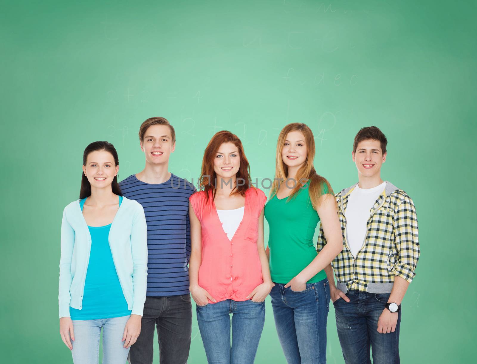 education and people concept - group of smiling students standing