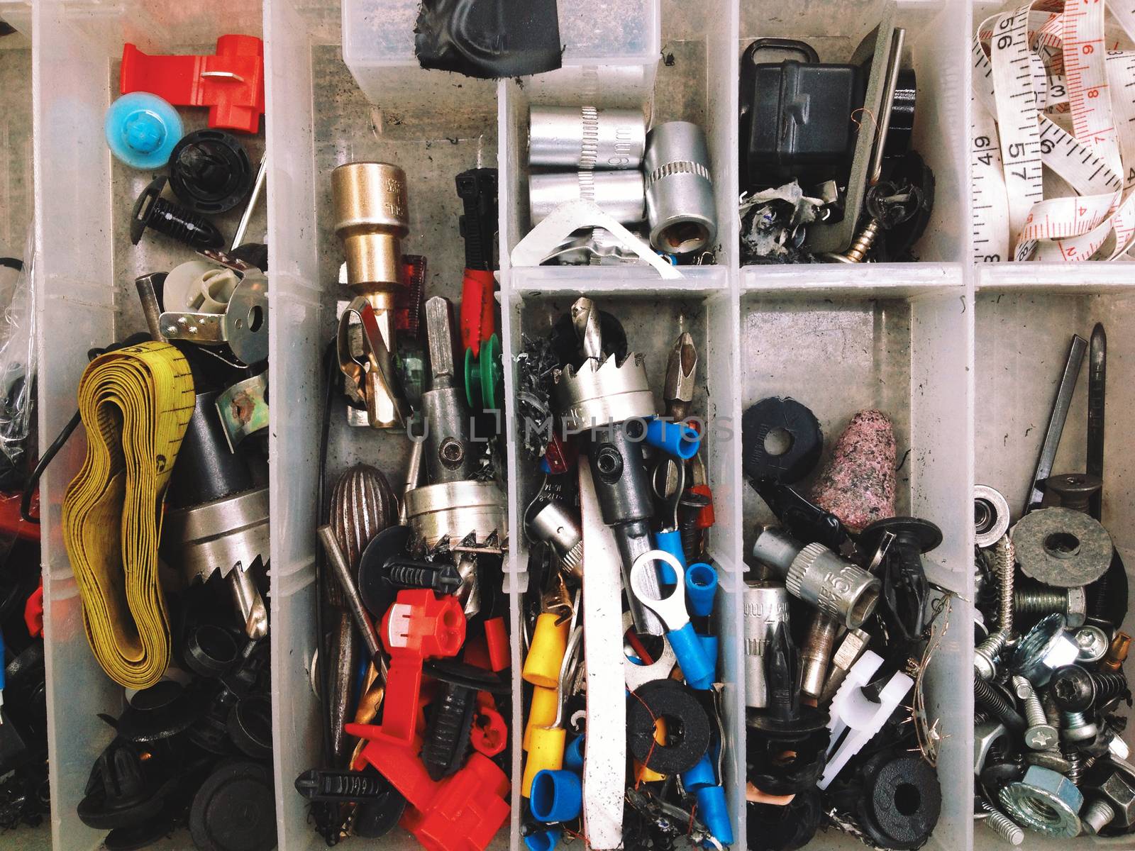 Close up of Nuts, bolts and screws in box background