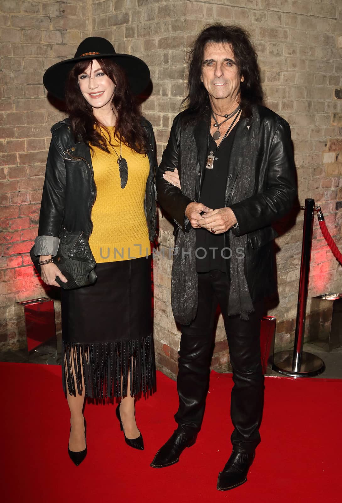 UK, London:  Alice Cooper (pictured with Sheryl Cooper) won the Classic Album award at the Classic Rock Roll of Honour awards at the Roundhouse, in London on November 11, 2015. Queen took out the award for Living Legends.