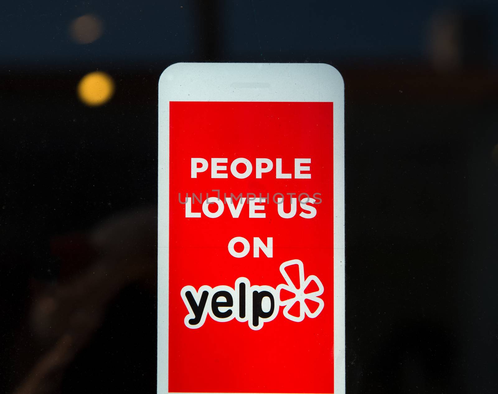 Yelp Emblem and Logo on Business Exterior by wolterk