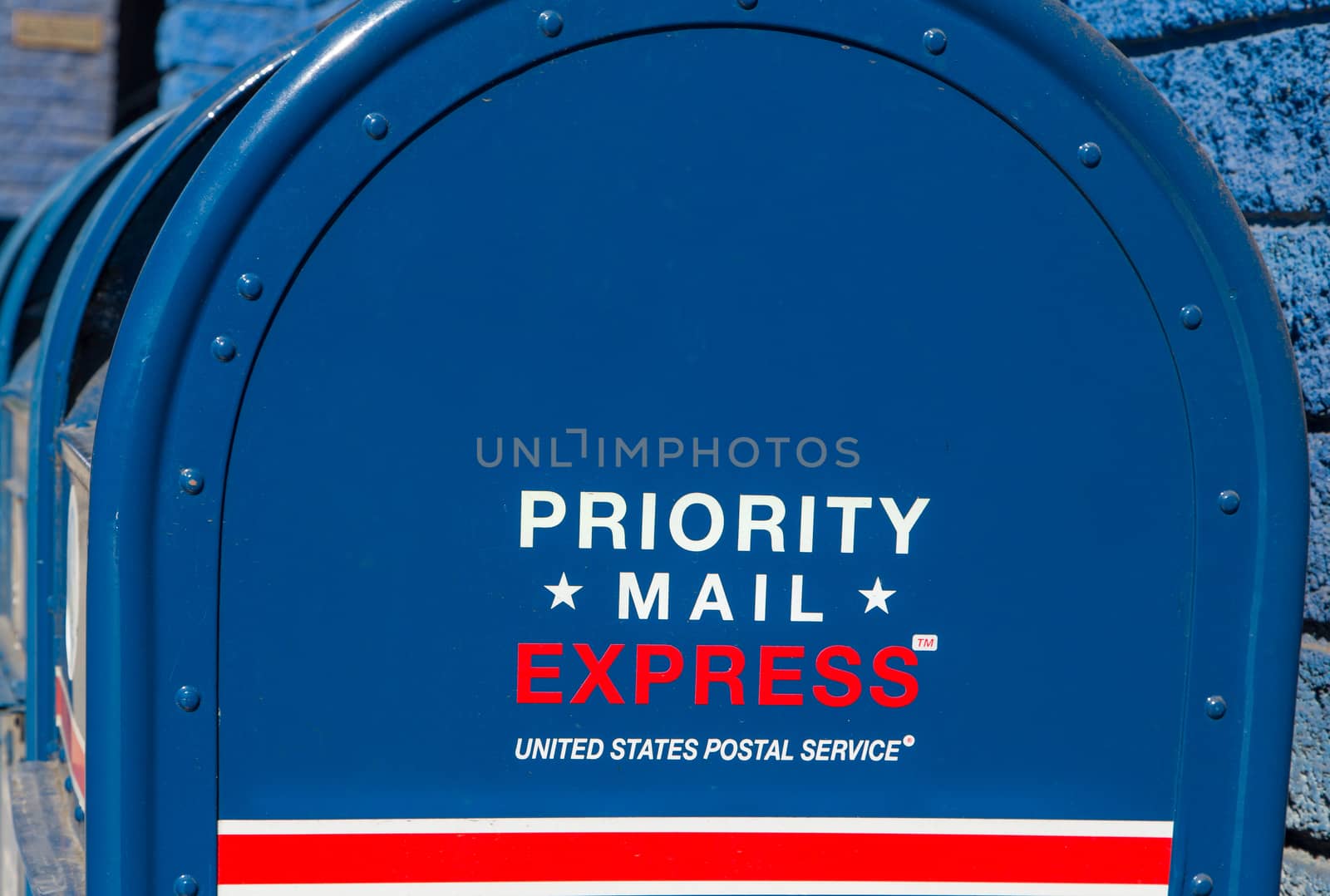 LOS ANGELES, CA/USA - NOVEMBER 8, 2015: Priority Mail Express mailbox. Priority Mail Express is a service of the United States Postal Service.