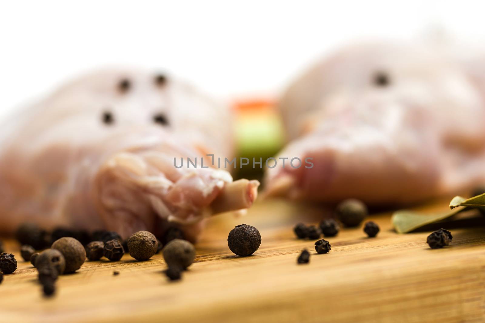 Raw rabbit with black pepper and allspice