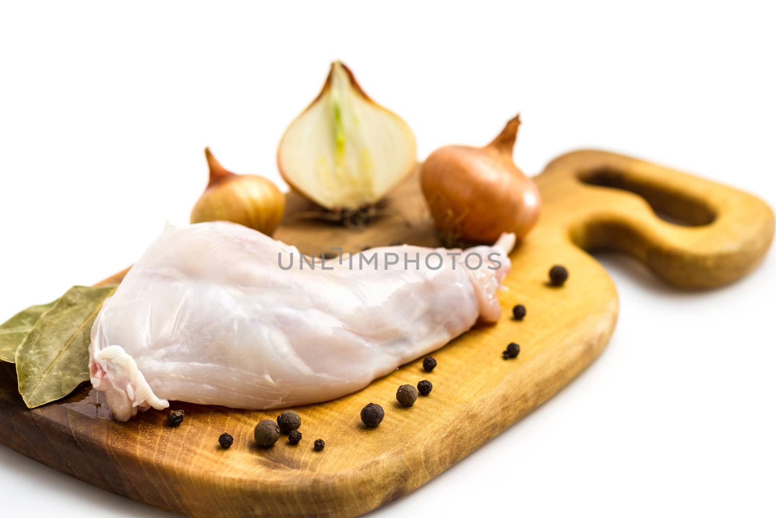 Raw rabbit with black pepper and allspice