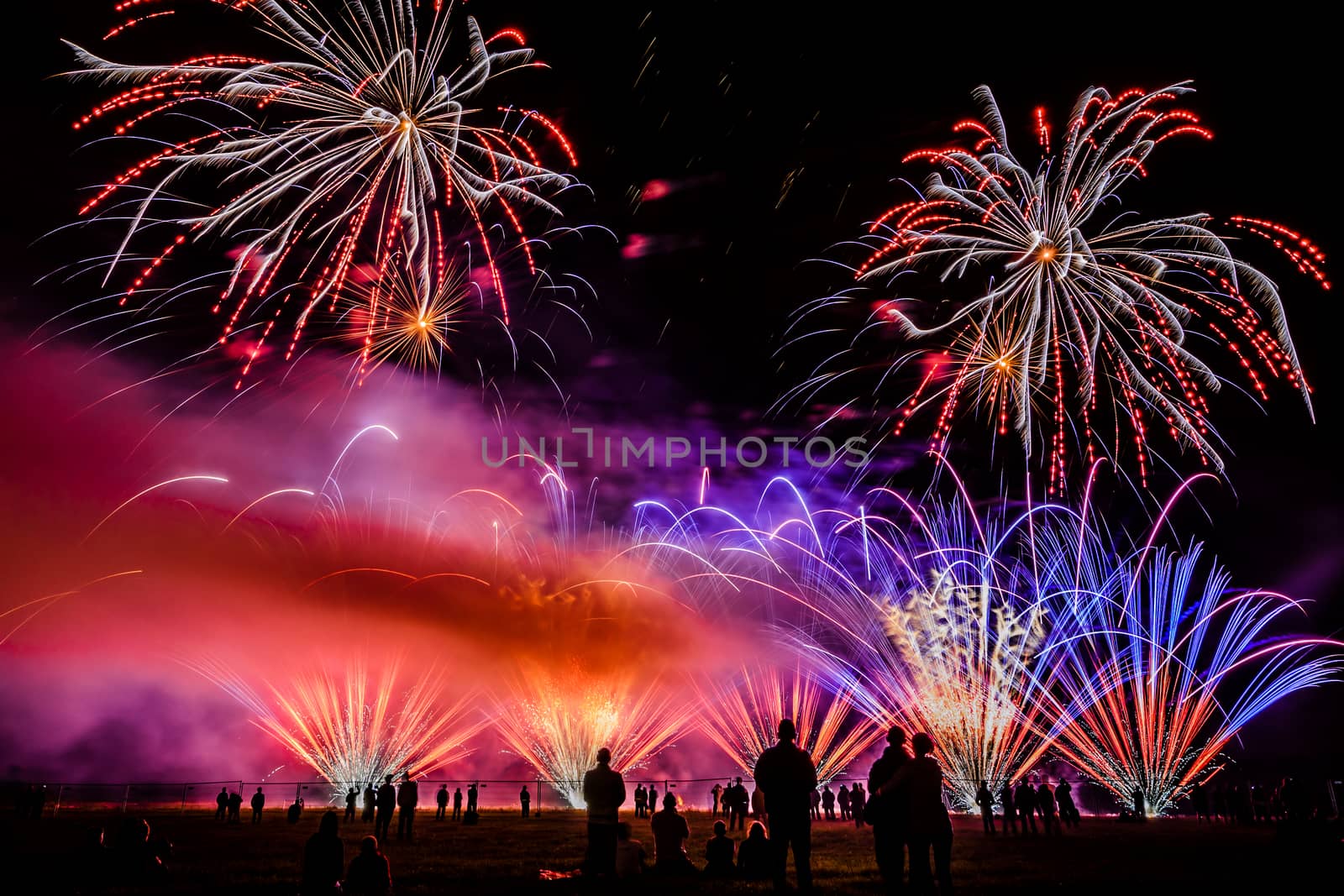 Colorful fireworks over night sky by Attila