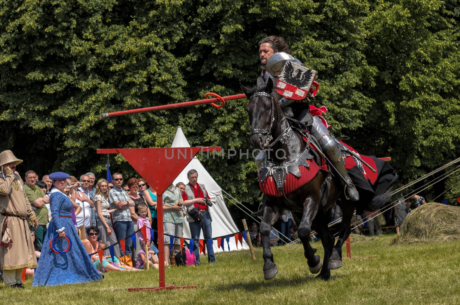 CHORZOW,POLAND, JUNE 9: Medieval knight on horseback showing the by Attila